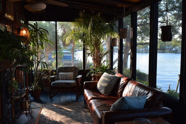 Florida Cracker sunroom featuring Hurricane Windows in Pinellas County, FL with waterfront views