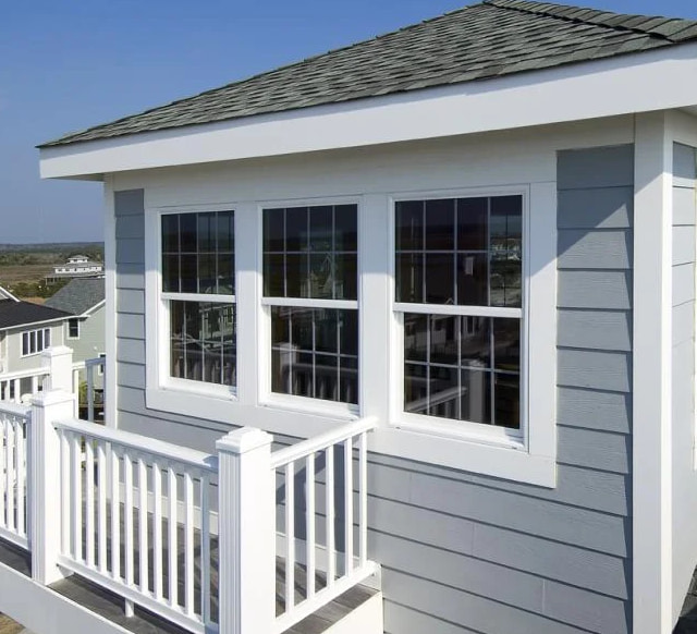 Exterior view of coastal home featuring strong impact glass for hurricane windows Clearwater, FL