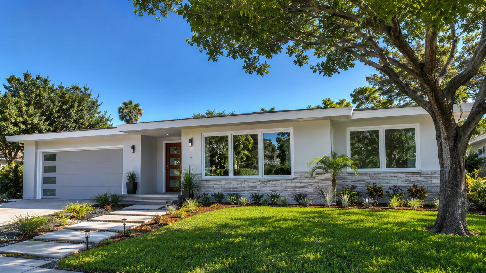 PGT WinGuard vinyl impact-resistant windows on a Mid-Century Modern Florida Ranch home in Clearwater FL